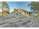 Side exterior view of a single Gathering home featuring several windows and freshly installed exterior paint at 505 Shanklin Ave, Bartow, FL 33830