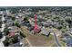 Expansive aerial view of a residential area with a highlighted property featuring a pool at 5612 Vintage View Blvd, Lakeland, FL 33812