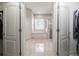 Elegant bathroom showcasing an inviting soaking tub and separate shower, enhancing relaxation and comfort at 5612 Vintage View Blvd, Lakeland, FL 33812
