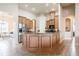 Open kitchen featuring stainless steel appliances, wood cabinetry, and granite countertops at 5612 Vintage View Blvd, Lakeland, FL 33812