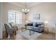 Cozy living room with ample natural light, stylish furnishings, and elegant decor at 5612 Vintage View Blvd, Lakeland, FL 33812