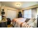 Comfortable bedroom with natural light, a closet, and neutral tones for relaxation at 610 Cottage Ln, Lakeland, FL 33803