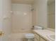 Standard bathroom with a bathtub/shower combination, toilet, and sink with vanity at 6315 Conductor Ct, Lakeland, FL 33813