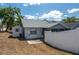 Exterior home view highlighting the shed, back patio, and screened porch area at 6315 Conductor Ct, Lakeland, FL 33813