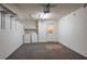 Spacious garage featuring a washer, dryer, and utility sink for added convenience at 6315 Conductor Ct, Lakeland, FL 33813