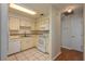 Bright kitchen with white appliances and cabinetry, offering a functional cooking space at 6315 Conductor Ct, Lakeland, FL 33813