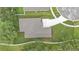 Aerial view of the home showcasing the roof, landscaping, and driveway at 803 Allison Place, Bartow, FL 33830