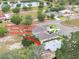 Aerial view of a new construction home in a residential neighborhood near a tranquil lake, 803 Allison Place at 803 Allison Place, Bartow, FL 33830