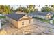An aerial view showcases a single-story home in a landscaped setting at 803 Allison Place, Bartow, FL 33830