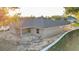 Aerial view of the home's backyard with a covered patio and exterior windows at 803 Allison Place, Bartow, FL 33830