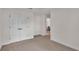 Bedroom featuring neutral carpet, bright white trim and paint, and double-door closet at 803 Allison Place, Bartow, FL 33830