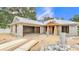 A partial view of the home's frame shows its spacious design and architectural potential at 803 Allison Place, Bartow, FL 33830
