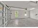 Clean and spacious two car garage with windows for natural light at 803 Allison Place, Bartow, FL 33830