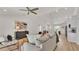 Bright and airy living space flowing into a stylish kitchen, perfect for entertaining and modern living at 803 Allison Place, Bartow, FL 33830