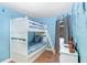 Bunk bedroom boasts a twin-over-twin bunk bed and cheerful Disney decals at 8838 Coral Palms Ct # A, Kissimmee, FL 34747