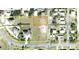 Aerial view of a vacant lot in a residential neighborhood near Eagle Lake at 0 Eagle Lake Loop Rd, Eagle Lake, FL 33839