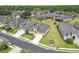 Aerial view of a residential neighborhood showcasing well-maintained homes and landscaping at 1049 Stoney Creek Dr, Lakeland, FL 33811