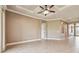 Large living room with a ceiling fan, with plenty of natural light at 1049 Stoney Creek Dr, Lakeland, FL 33811