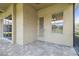 An outdoor patio with block pavers and an exterior door at 1049 Stoney Creek Dr, Lakeland, FL 33811