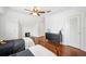 Spacious bedroom featuring hardwood floors, a fireplace and classic architectural elements at 112 Hiawatha Trl, Lakeland, FL 33803