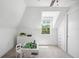 Bright bedroom featuring a sloped ceiling and ample closet space at 112 Hiawatha Trl, Lakeland, FL 33803