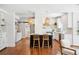 Open floor plan showing a bright kitchen featuring an island and adjacent living space at 112 Hiawatha Trl, Lakeland, FL 33803
