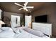Spacious main bedroom with adjacent bathroom, walk-in closet and comfortable decor at 112 Hiawatha Trl, Lakeland, FL 33803