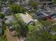 Aerial view of the property with outlined borders showing the location on a tree-lined street at 117 Palmola St, Lakeland, FL 33803