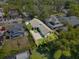 Aerial view of the property with outlined borders showing the location with a long driveway and back yard at 117 Palmola St, Lakeland, FL 33803