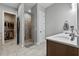 Bright bathroom featuring a walk-in shower and walk-in closet at 117 Palmola St, Lakeland, FL 33803