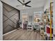 Contemporary office space with stylish accent wall, ample storage, and natural light at 1280 Denali Dr, Winter Haven, FL 33880