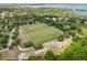 An aerial view of a soccer field surrounded by lush greenery, providing a recreational area at 13137 Lake Butler Blvd, Windermere, FL 34786