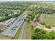 Aerial view of a boat storage facility with a multitude of boats parked, showcasing waterfront amenities at 13137 Lake Butler Blvd, Windermere, FL 34786