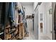 Well-organized closet featuring shelving for shoes, hanging rods for clothes, and a sliding door at 13137 Lake Butler Blvd, Windermere, FL 34786
