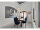 Elegant dining room with a round table, statement lighting, and architectural details at 13137 Lake Butler Blvd, Windermere, FL 34786