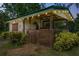 Well lit horse stall at dusk offers a secure place for horses with easy access to pasture and necessary storage at 13137 Lake Butler Blvd, Windermere, FL 34786
