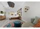 Inviting main bedroom with decorative rug, seating, and a sliding barn door at 13137 Lake Butler Blvd, Windermere, FL 34786