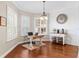 Bright office space with hardwood floors, shiplap accent wall, and plenty of natural light at 150 Berkley Knights Dr, Auburndale, FL 33823