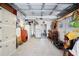 Spacious garage with ample storage space and tools, perfect for projects and organization at 1506 Longbow Dr, Lakeland, FL 33810