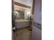 Cozy full bathroom with a light-colored vanity and commode at 1610 Reynolds Rd # 80, Lakeland, FL 33801