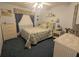 Bedroom with light blue walls, a ceiling fan, and white wicker furniture at 1610 Reynolds Rd # 80, Lakeland, FL 33801