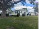 Charming single-story home with manicured lawn at 1610 Reynolds Rd # 80, Lakeland, FL 33801