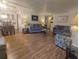 Comfortable living room with hardwood floors and ample seating at 1610 Reynolds Rd # 80, Lakeland, FL 33801