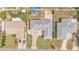 Overhead view of home with a large driveway and an expansive backyard at 170 Browning Cir, Winter Haven, FL 33884