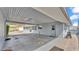 Spacious carport featuring a painted brick wall and direct access to the house at 170 Browning Cir, Winter Haven, FL 33884