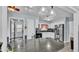 Bright kitchen featuring a breakfast bar and white cabinets at 170 Browning Cir, Winter Haven, FL 33884