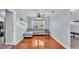 Inviting living room featuring hardwood floors and a comfortable sectional sofa at 170 Browning Cir, Winter Haven, FL 33884