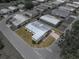 Charming home with a metal roof, well-maintained lawn, and proximity to neighborhood amenities and conveniences at 1823 Sherwood Hill Dr, Lakeland, FL 33810