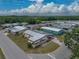 Community aerial view featuring charming single-story homes with well-manicured lawns and tree-lined streets at 1823 Sherwood Hill Dr, Lakeland, FL 33810