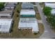 Charming single-story home with a metal roof and convenient access to local amenities and services at 1823 Sherwood Hill Dr, Lakeland, FL 33810